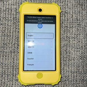 Slightly used I pod touch black with yellow case